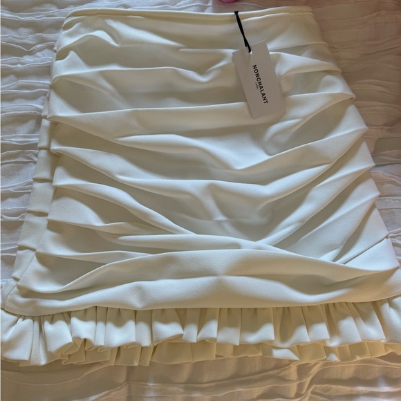 NWT nonchalant white mini skirt